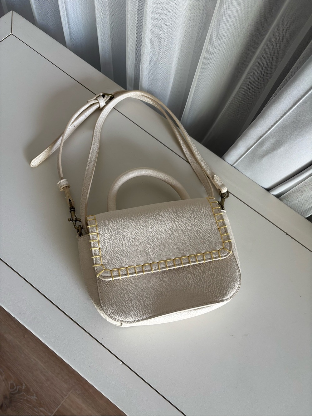 Elegant Cream Leather Crossbody Bag with Top Handle